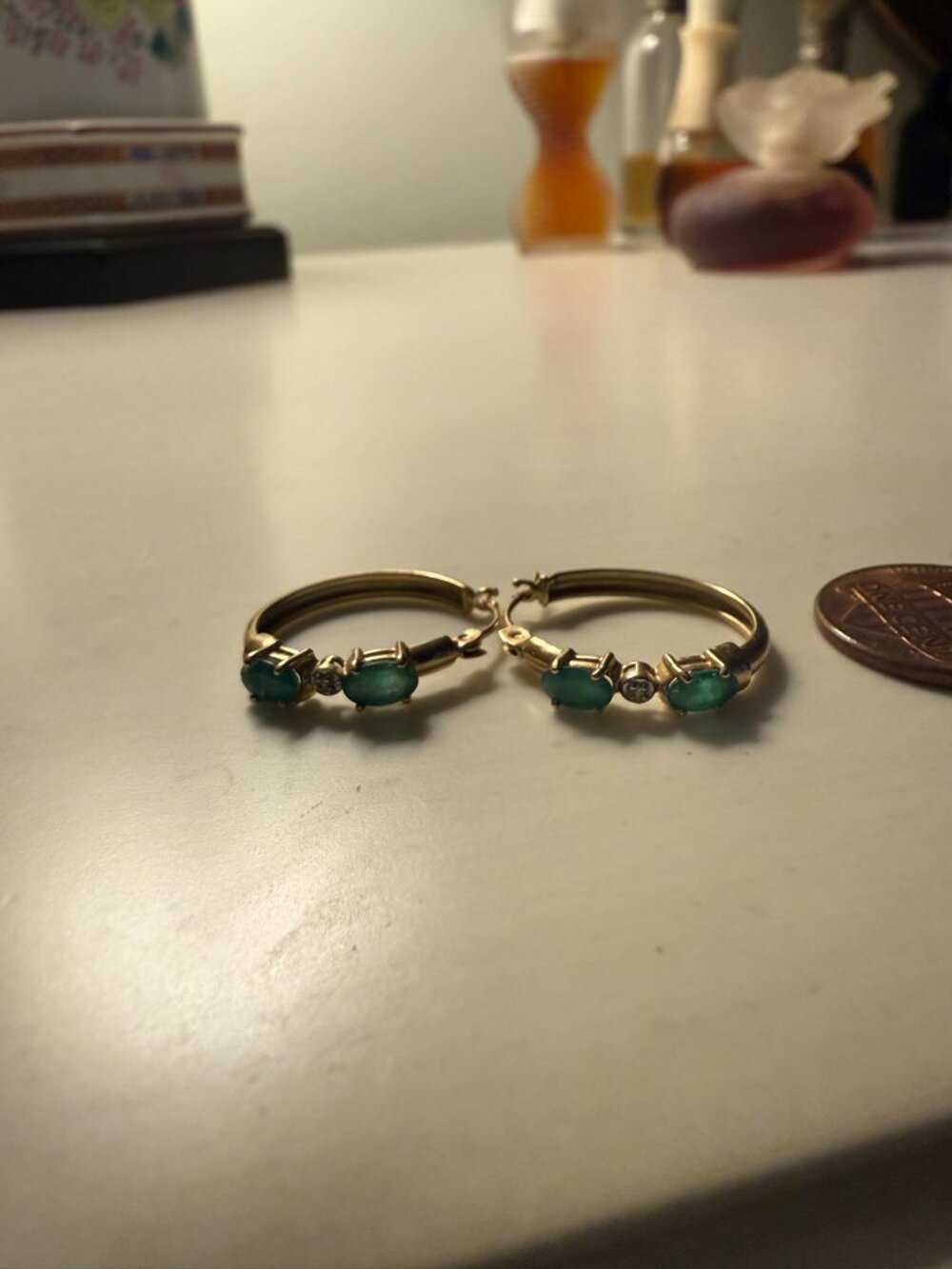 Small gold loop earrings